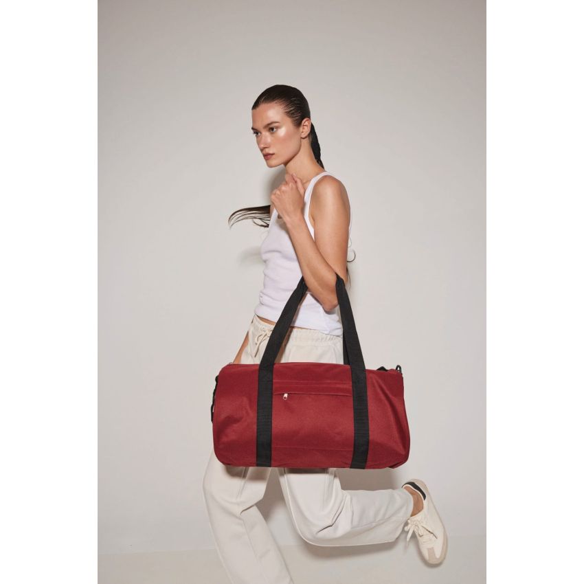 Recycled cylindrical bag with front pocket
