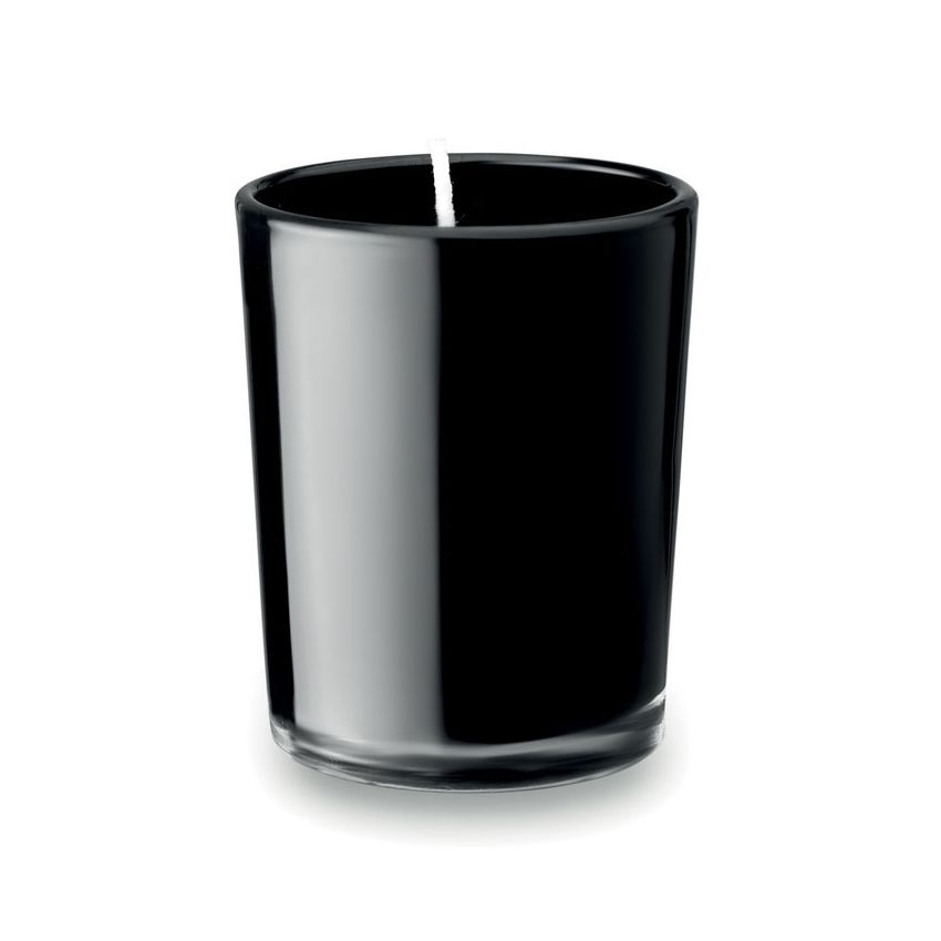 Small candle in glass